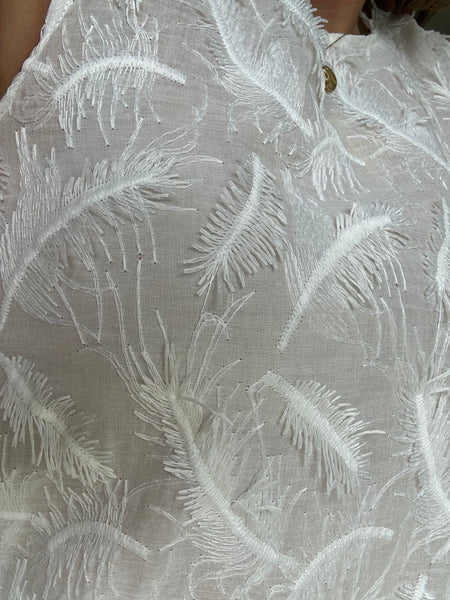 Top plume blanc