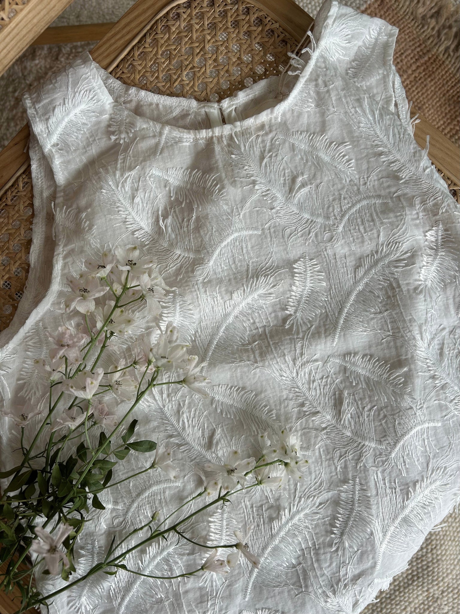 Top plume blanc